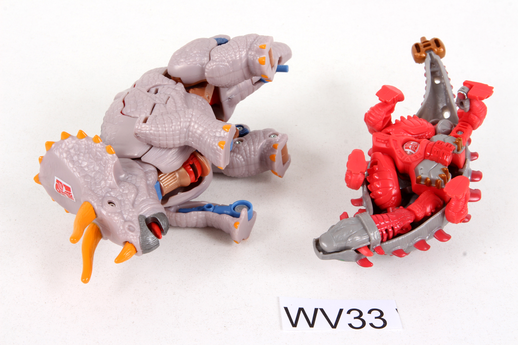 Complete Transformers® Universe Dinobots Triceradon and Slapper