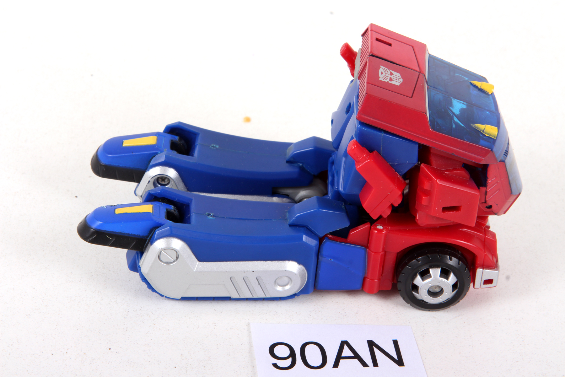 Complete Transformers® Animated Deluxe Class Cybertron Mode Optimus ...